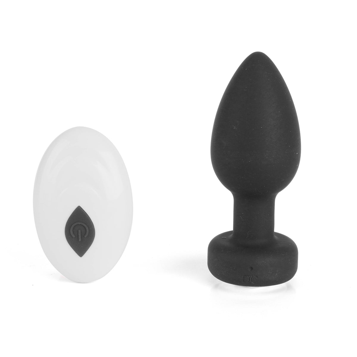 Black and white silicone butt plugs on a white background
