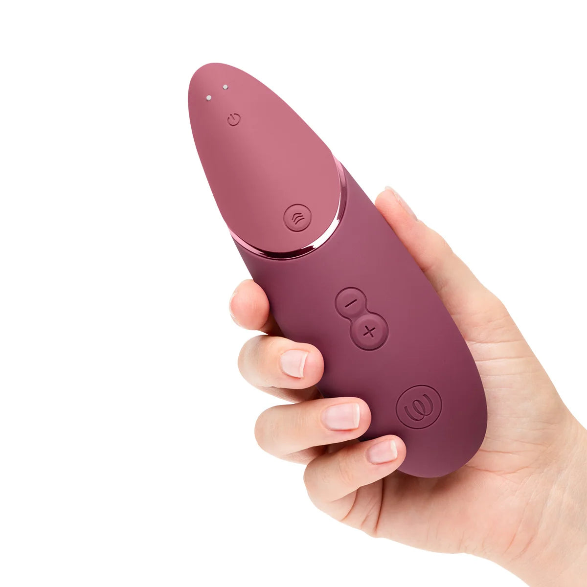 A women holding Womanizer Next Sensual Collection in Dusky Pink 
